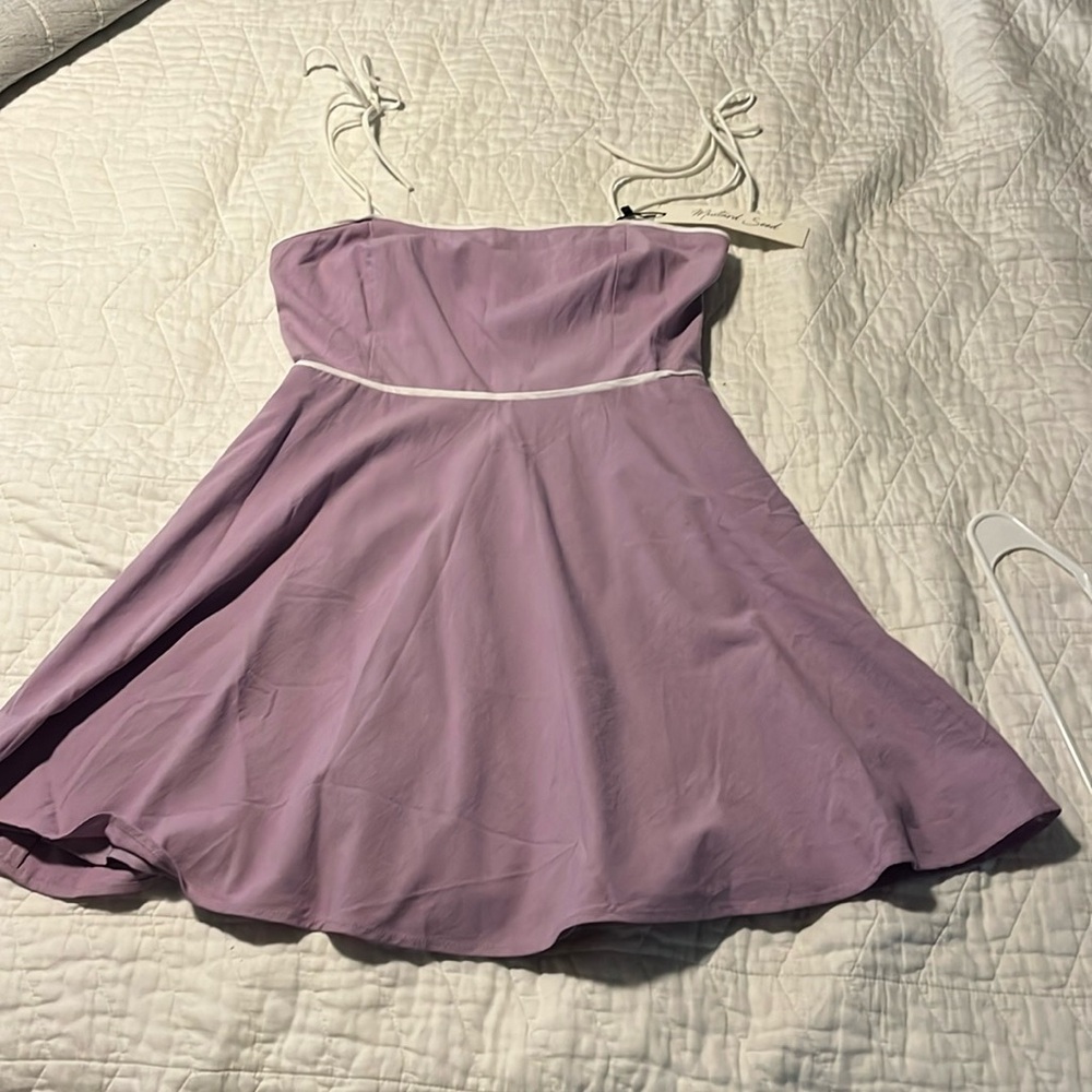 Purple mini dress with flowy skirt and bow spaghetti straps